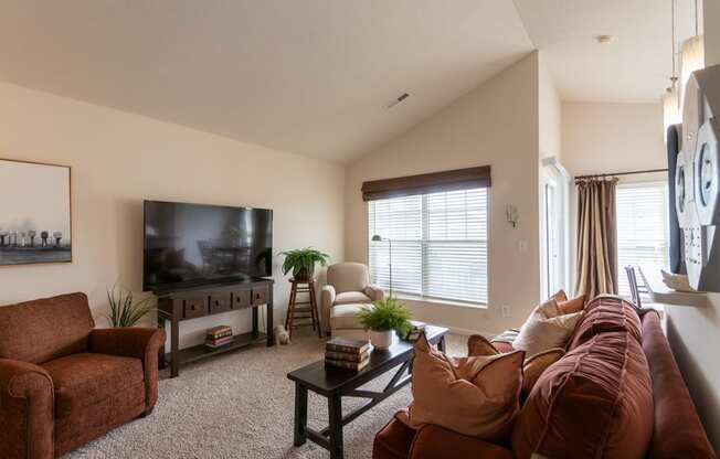 This is a photo of the living room  in the 1016 square foot, 2 bedroom, 2 bath Nautica floor plan at Nantucket Apartments in Loveland, OH.
