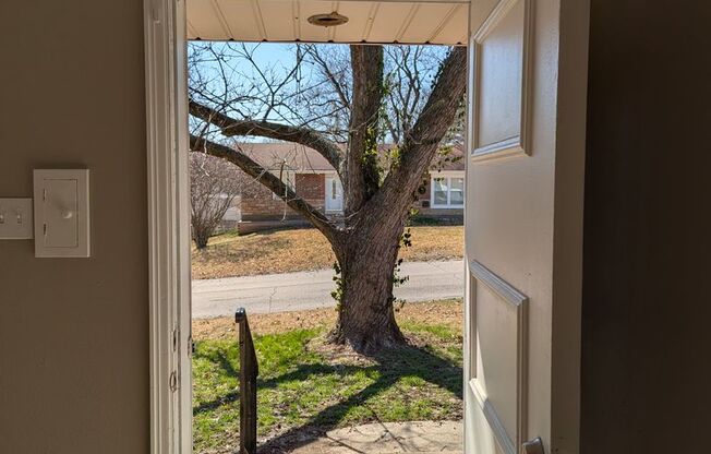 Fully Renovated Home with Sunroom, Garage & Huge Fenced Yard