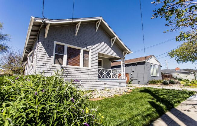 Charming 2 Bedroom House with Expansive Workshop Garage