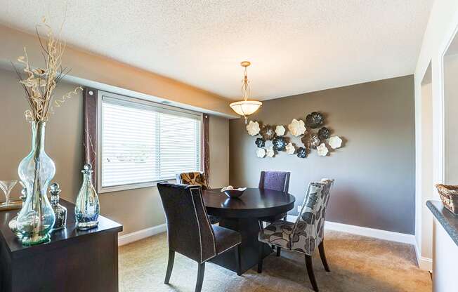 Dining room in a signature series 2-bedroom, 2-bath apartment at Somerset Lakes.