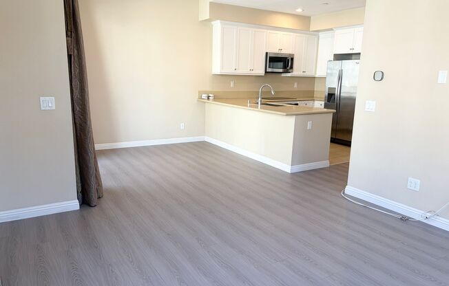 Stylish 3-Story Townhome with Balcony & Open-Concept Living