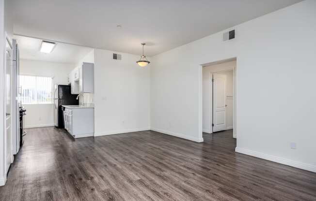 a kitchen and living room in a 555 waverly unit