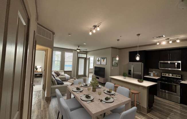 a rendering of a kitchen and dining room in an apartment