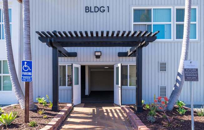 A building with the sign BLDG 1 on it.