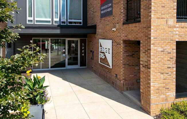 A brick building with a sign that says "Edge" on it.