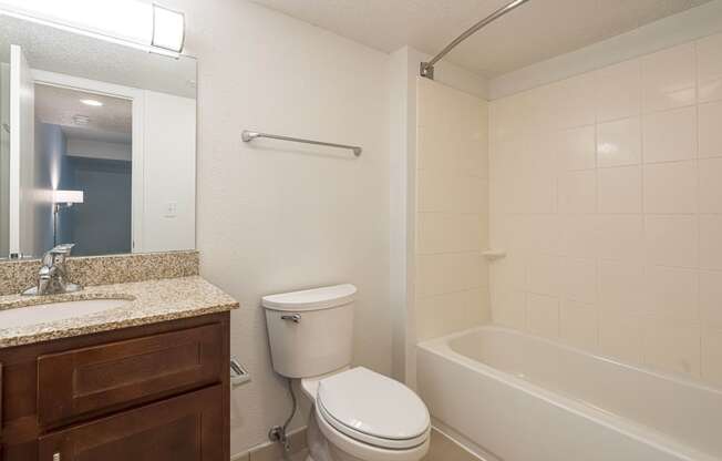 a bathroom with a sink toilet and bathtub