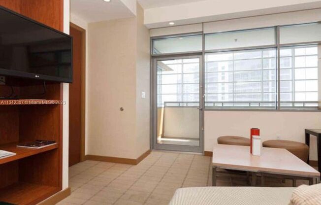 Experience luxury living in this bright and spacious 1-bedroom, 1-bathroom residence, featuring a large balcony and in-unit washer/dryer. Enjoy resort-style amenities, fitness center, pool, and more. Residents also benefit from hotel-like services and inc