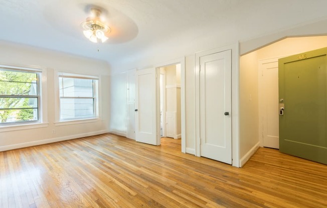 Palladian Apartments | #306 Spacious Living Room with natural light filled windows