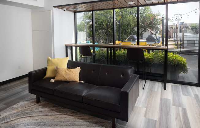 Lounge space in the community room at The Landing at 1001 NP, Fargo, North Dakota 58102