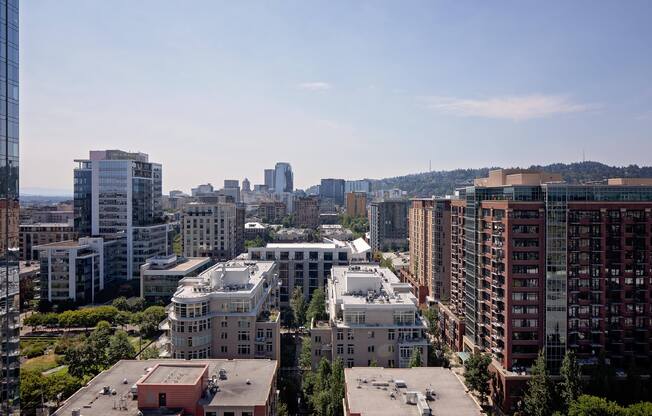 a view of the city from the roof of a building