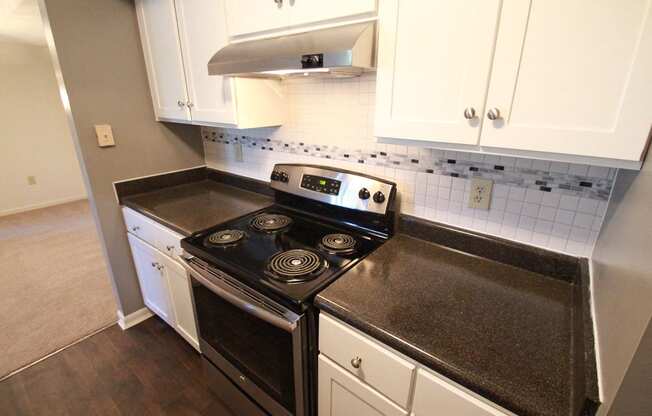 This is a photo of an upgraded kitchen in the 1056 square foot 2 bedroom Gainsway at Trails of Saddlebrook Apartments in Florence, KY.