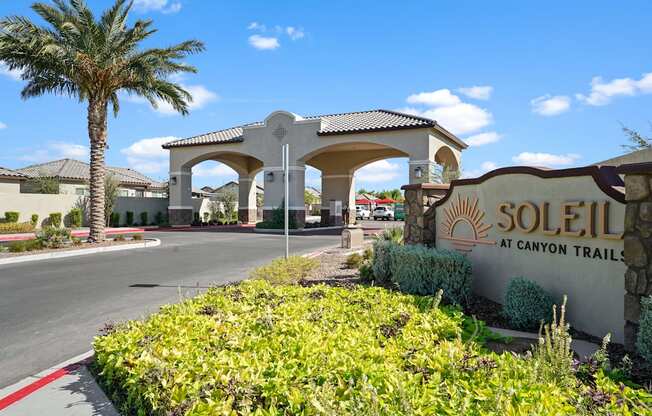 a sign for solstice at canyon trail sits in front of a building