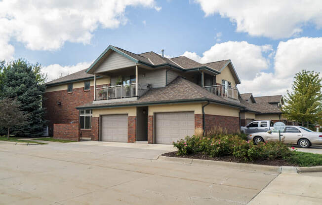 View of villas with attached garages and balconies at Southwind Villas in southwest Omaha in La Vista, NE, 68128