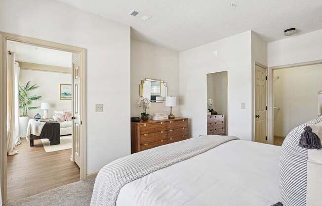 Spacious bedroom with natural light and neutral decor in Tattersall Village Apartments, Hinesville, GA