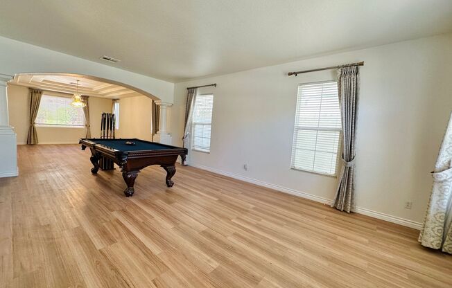Stunning home in a guard gated community inside Rhodes Ranch with tons of community amenities. Almost 5,000 sq ft home with 3-car garage, 4 bedrooms with 4.5 bathrooms. Huge loft upstairs.