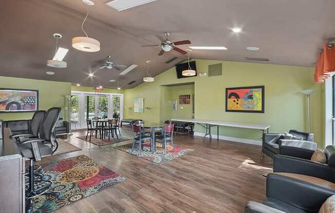 Community Clubhouse with Lounge Furniture at Fountains Lee Vista Apartments in Orlando, FL.