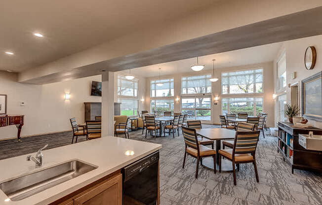 Large Social Room with Fireplace and Kitchen at VINTAGE AT BREMERTON, Bremerton, WA, 98310