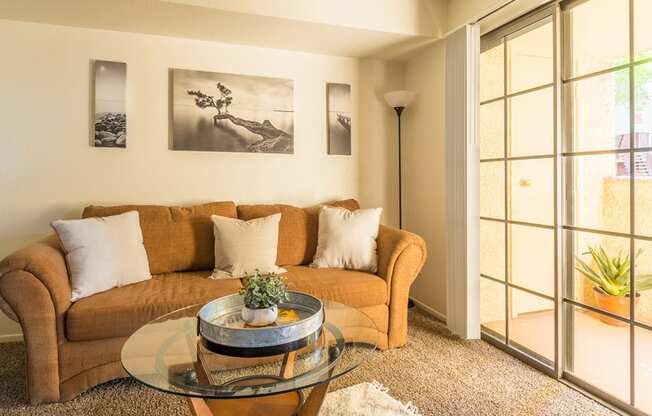 El Encanto spacious living room with sliding glass doors and plenty of natural light