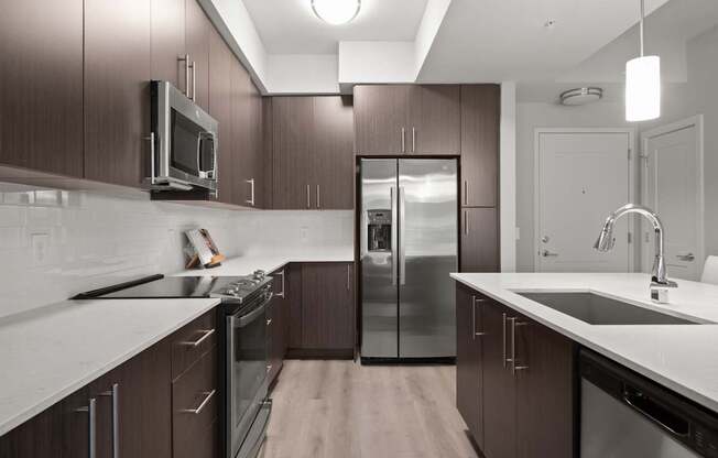 Fully-equipped kitchens with electric top ranges, double-sided refrigerators, built-in microwaves and dishwashers