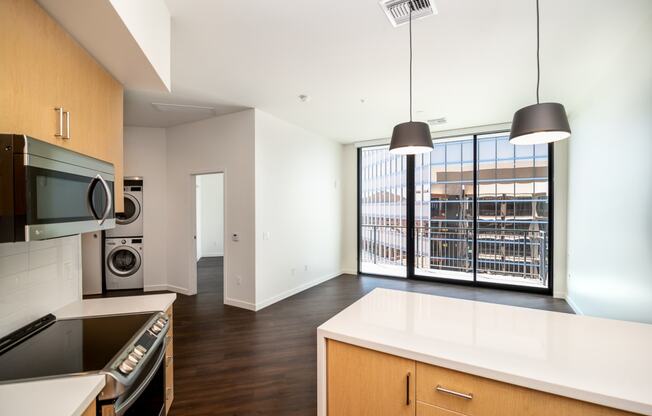 Kitchen and living room at RendezVous Urban Flats in Tucson AZ