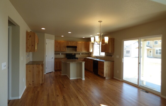 Lovely 2 Story Home in Windsor's Raindance Community! Corner Lot!