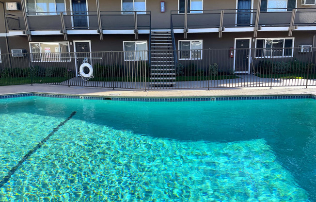 Towne Centre at Orange Apartments with swimming pool.