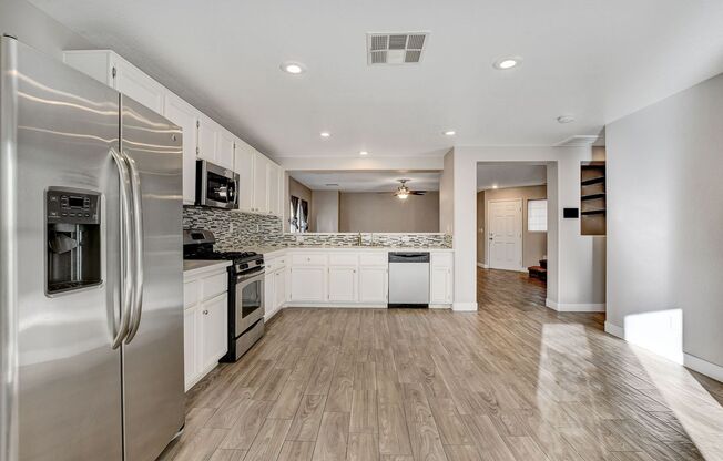 Totally Updated Solar Powered 4 Bedroom! Bedroom and Bath Downstairs!