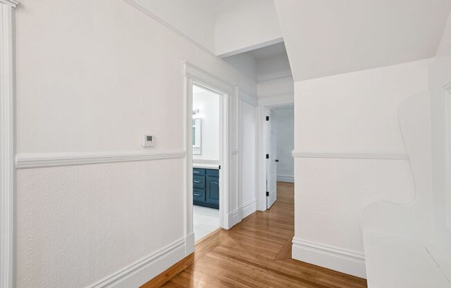Bright pet friendly 3BR 2BTH with modern kitchen, wood flrs and laundry in unit!