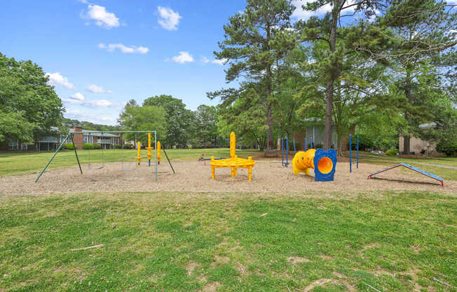 A playground with a yellow slide at Lexington on the Green, North Carolina