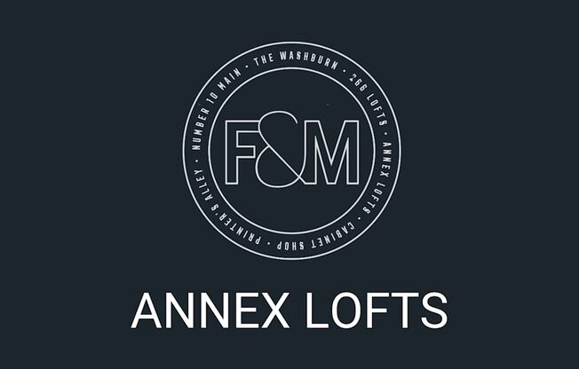 a white and black logo on a black background