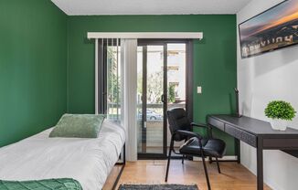 A fully furnished 4 bedroom, 2 bathroom apartment with common areas at 1823 Pelham Ave. Unit 1