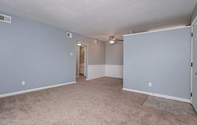 Indian Hills Apartments living room with carpeting