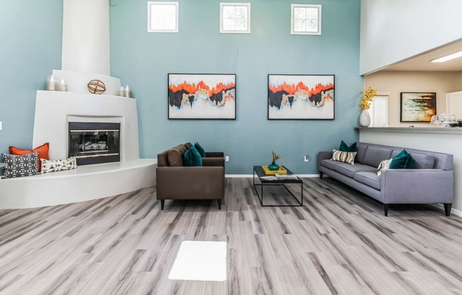 a living room with two couches and a fireplace