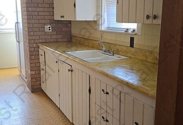 Spacious 2 bedroom 1 bath with large garage.