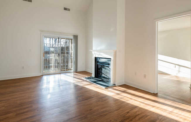 Living Room with Fireplace and Balcony