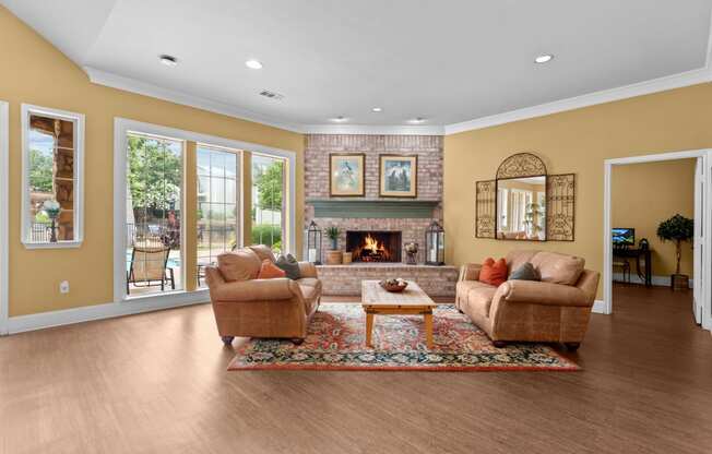 a living room with two couches and a fireplace