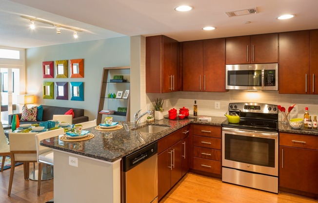 Contemporary Kitchens With Custom Cabinetry, Stainless Steel Appliances and Granite Countertops