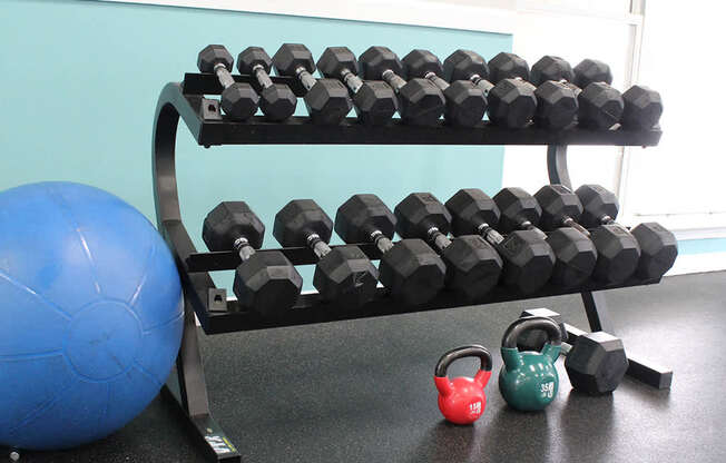 A conference room with a long table and chairs.