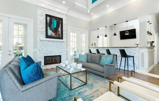 Resident lounge with fireplace at Marbella Place, Georgia