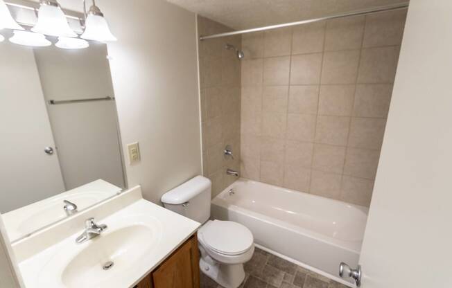 This is a photo of the full bathroom of the 902 square foot, 2 bedroom, 1 and a half bath apartment at Blue Grass Manor Apartments in Erlanger, KY.