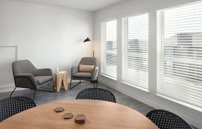 a meeting room with chairs and a table