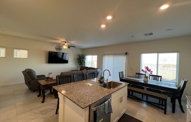 beautiful 3 bedroom 2 and half bath home is located in the Symmetry Bay Cadence community