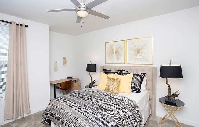 Bedroom with cozy bed and lamp at Robley Place, Lafayette