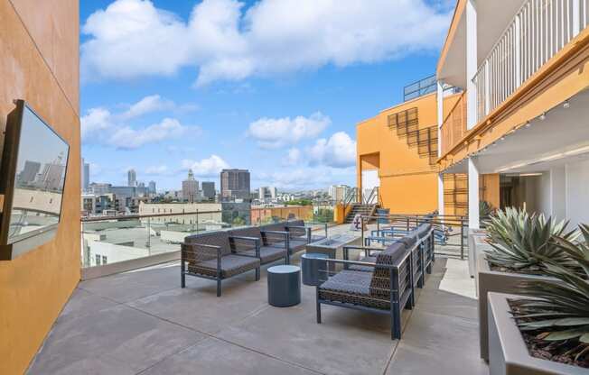 rooftop patio with comfortable seating at One Santa Fe apartments