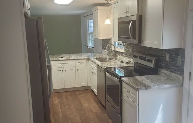 Lovely Updated 3-Bedroom Home with Spacious Backyard