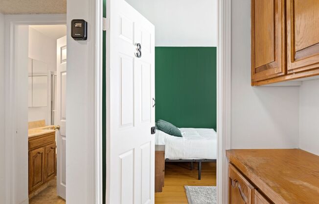 A fully furnished 4 bedroom, 2 bathroom apartment with common areas at 1823 Pelham Ave. Unit 5