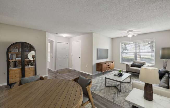 Spacious Living Area With Wood-Style Flooring