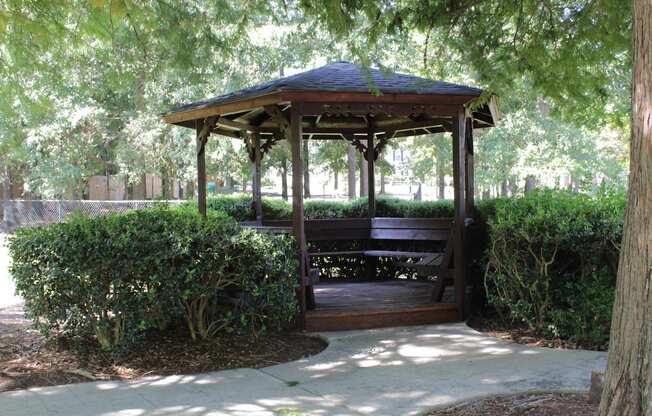 a gazebo with a bench at Stillwater at Grandview Cove in Simpsonville, SC