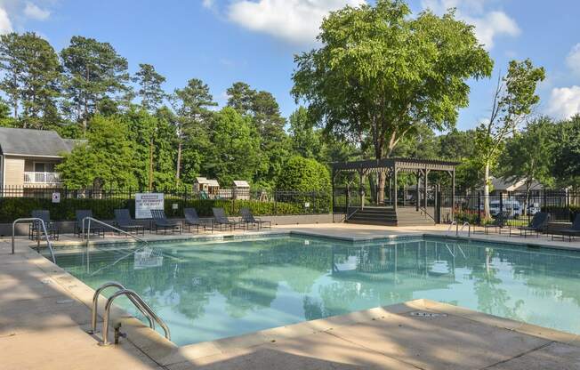 Pool side patio at Harvard Place Apartment Homes by ICER, Lithonia, 30058