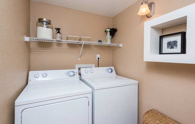 Laundry Room at Apres Apartments in Aurora, CO